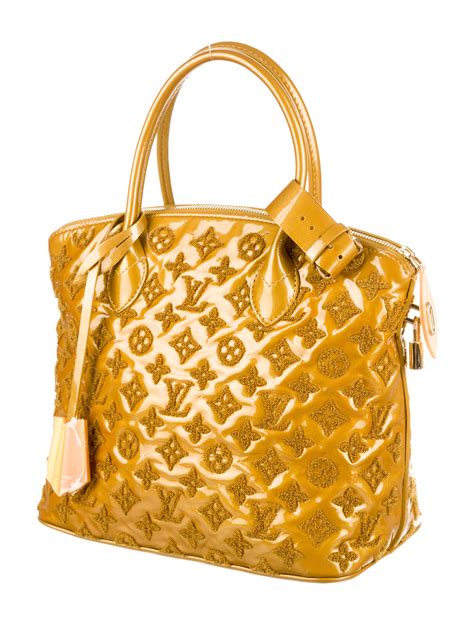 louis vuitton lockit handbag.